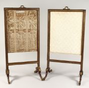 A PAIR OF GOOD QUALITY BRASS INLAID FIRE SCREENS on curving legs with brass feet. 2ft 10ins high x
