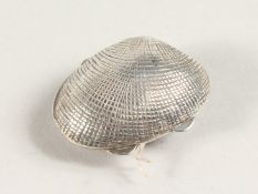 A SILVER CLAM SHELL PILL BOX