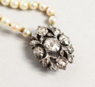 A DOUBLE ROW OF PEARLS with diamond clasp