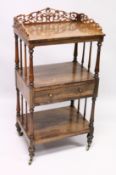 A LATE REGENCY ROSEWOOD TURNED TIER WHAT-NOT, the top with pierced fret work, centre drawer,