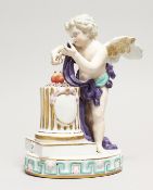 A DRESDON PORCELAIN GROUP, CUPID-LOVE, with two hearts on a pedestal. 8ins high.