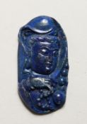 A CARVED LAPIS PENDANT