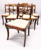 A SET OF SIX REGENCY ROSEWOOD BRASS INLAID SINGLE CHAIRS with drop in seats and sabre legs