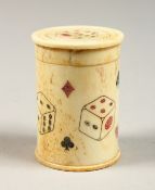 AN ETCHED BONE CIRCULAR DICE BOX