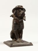 A GOOD SMALL BRONZE DOG INKWELL on a square base. 4ins high.