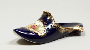 A GOOD MEISSEN PORCELAIN SLIPPER with rich blue ground edged in gilt and painted with an oval of