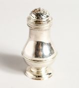 A GEORGE II SILVER PEPPER with crest. 4ins high London 1736, maker George Jones