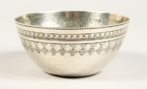 AN ISLAMIC ENGRAVED CIRCULAR SILVER BOWL