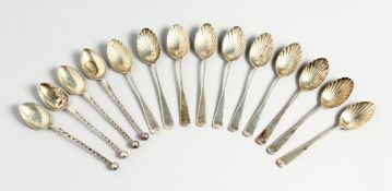 A SET OF TEN VICTORIAN SILVER COFFEE SPOONS with shell bowl. London 1891 and four odd spoons (14)
