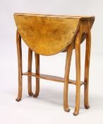 A POLLARD OAK OVAL DROP FLAP TABLE with undertier and curving legs.