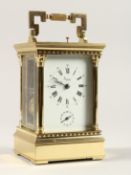 A GOOD ASPREYS BRASS CARRIAGE CLOCK with alarm. 6ins high.