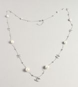 A PAIR OF SILVER AND PEARL NECKLACE.