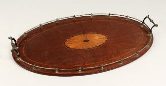 AN EDWARDIAN INLAID WOODEN TRAY with silver handles and gallery.
