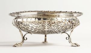 A JAMES DIXON AND SONS SILVER CIRCULAR PIERCED FRUIT BOX on three claw feet 8ins diameter