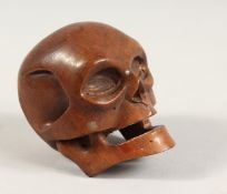 A CHINESE CARVED WOODEN SKULL Signed