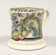 A CANTON PATTERN POTTERY MUG. 4.5ins high