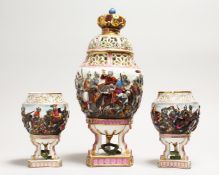 A CAPODIMONTE PORCELAIN PIERCED GARNITURE, large vase and cover and a pair of vases. 14 ins & 6.5ins