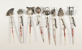 EIGHT CHINESE SILVER COCKTAIL STICKS