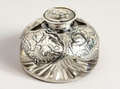A SILVER MOUNTED CIRCULAR INKWELL with five cherubs design London 1905