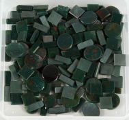 A BOX OF BLOODSTONE LOOSE STONES