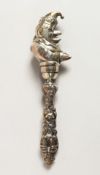 A STERLING SILVER PUNCH BABIES' RATTLE.
