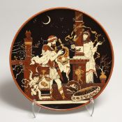 A GOOD METTLACH POTTERY CHARGER. Signed by HEINR SCHLITT No.2199. 15ins diameter