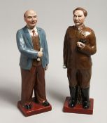 A PAIR OF RUSSIAN PORCELAIN STANDING FIGURES 13.5ins higH.