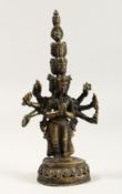 A TIBETIAN BRONZE MULTI HEAD GOLD FIGURE 7.5ins high