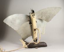 An ELECTRIC HEATER as a butterfly on a branch. 27ins high.