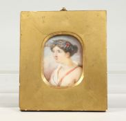 A GEORGIAN MINIATURE OF A FRENCH CLASSICAL HEAD AND SHOULDERS. 2.75ins x 2ins, in a gilt frame,