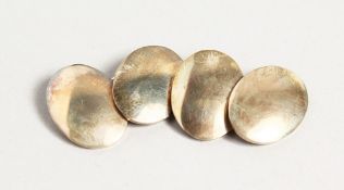 A PAIR OF PLAIN SILVER CUFF LINKS