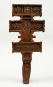 AN 18TH CENTURY GREEK CARVED WOODEN CROSS. 15ins long.