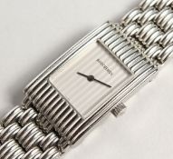 A GOLD BOUCHERON STEEL WRIST WATCH.