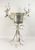 A LONG, STANDING STAG MOUNTED WINE COOLER on plated antler legs 3ft high.