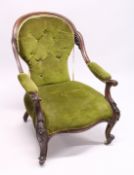 A VICTORIAN MAHOGANY SHAPED BACK ARMCHAIR, open arms, serpentine fronted seat on cabriole legs