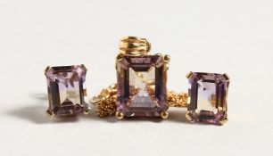 A 9CT TWO-COLOUR AMETHYST NECKLACE AND EARRINGS SET.