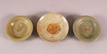 THREE EARLY CHINESE POTTERY BOWLS, of varying style and size (3)