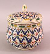 A TURKISH OTTOMAN DECORATED POTTERY BOWL & COVER, 13.5CM