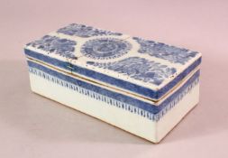 A 18TH / 19TH CENTURY CHINESE BLUE & WHITE PORCELAIN PEN BOX & COVER, decorated with fruit and