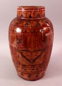 A LARGER NORTH AFRICAN RED GLAZED POTTERY VASE, with floral motif decoration, 31cm