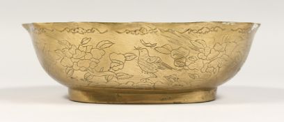 A CHINESE ENGRAVED BRASS OVAL BOWL, 8cm long.