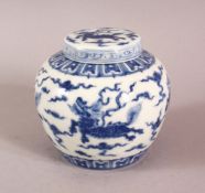 A CHINESE BLUE & WHITE PORCELAIN JAR & COVER, with decoration of kylin and clouds, base with a mark,
