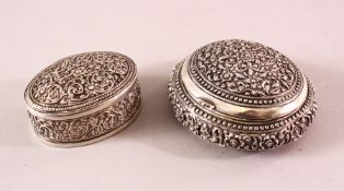 TWO 19TH CENTURY SRI LANKAN SILVER BOXES with filigree decoration, 7.5cm and 5.5cm wide.