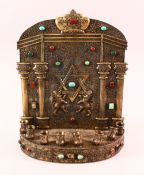 A GOOD JEWISH METAL CANDLESTICK HOLDER, with a star and twin lion decoration to the plate, with