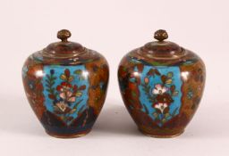 A SMALL PAIR OF CLOISONNE KORO AND COVERS, the bodies decorated insects, flowers and birds, 8cm