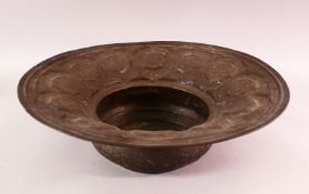 A LARGE 18TH CENTURY DAMASCUS MAMLUK REVIVAL BRASS BASIN, with traces of silver inlay, with embossed