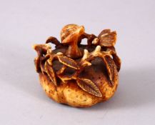 A CHINESE CARVED BONE PUMPKIN FORMED SNUFF BOTTLE, with carved fruit and vine decoration, 5cm