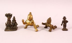 A COLLECTION OF FOUR SMALL BRONZE INDIAN FIGURES, largest 6cm high.