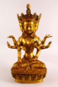 A LARGE CHINESE GILT BRONZE FIGURE OF A MULIT FACED BUDDHA, in a seated pose with multi arms, upon