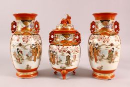 A GARNITURE OF JAPANESE KUTANI VASES, the central vase formed as a koro and cover, flanked by a pair
